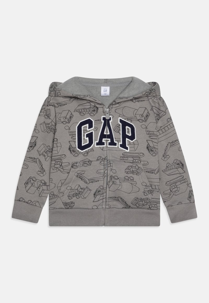 Sweat à capuche gris zippé avec des contours de véhicules de construction et de grandes lettres "GAP" en noir et blanc sur le devant.