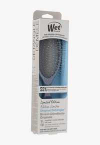 Wet Brush Original Detangler in een limited edition verpakking. Kenmerkt zich door een flexibel ontwerp met IntelliFlex haren en een blauw kleurenschema.