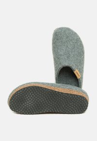 Gray felt slippers with open back, cork midsole, and textured rubber outsole. Brand label on side. Simple, functional design.