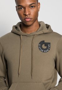 G-STAR G-STAR CIRCULAR CHEST HIT - Camisola - ashor