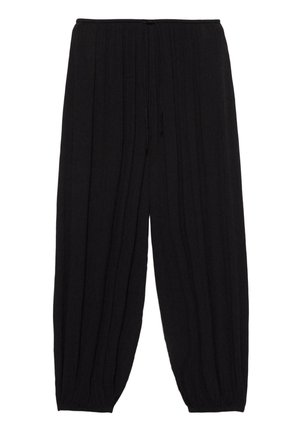 Pantalon noir à coupe ample avec taille élastique et poignets aux chevilles, présentant une subtile texture verticale et un cordon de serrage à la taille.