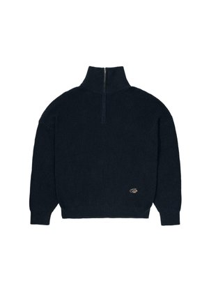 Dark navy ribbed knit sweater with high collar and short zipper, featuring a small embroidered emblem near the hem on the front right side.