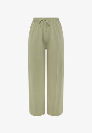 Luźne jasnoliściaste spodnie z elastycznym pasem i sznurkiem do wiązania, o prostym kroju nogawek.