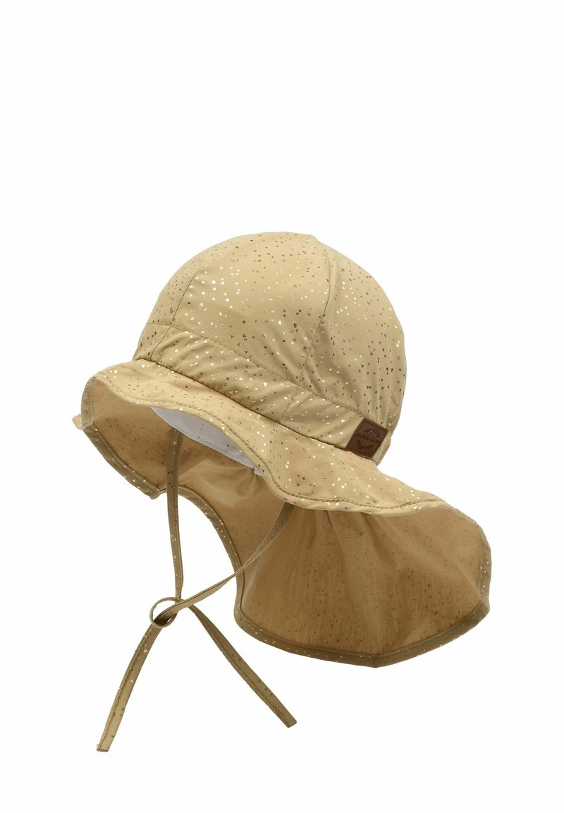 Chapeau seau beige clair avec un motif à pois brillants, large bord et sangle sous le menton. Fabriqué en tissu doux, avec une étiquette sur le côté.