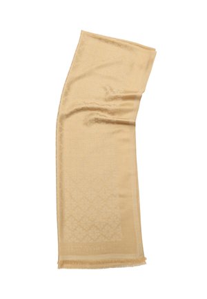 Beige scarf made of soft fabric, featuring a subtle floral pattern and fringed edges. “NEW YORK” is embossed near the base.