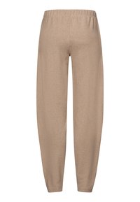 Beige, sweatpants met een elastische tailleband; gemaakt van zachte, gestructureerde stof; taps toelopend ontwerp met een losse pasvorm bij de enkels.