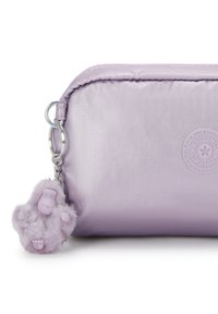 Purple satin pouch with rounded edges, featuring a plush monkey keychain and embossed logo. Smooth texture with zipper closure.