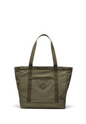 Sac cabas vert olive en tissu à motif losanges, doté de deux anses pour l'épaule, d'une poche frontale et d'un écusson carré avec logo dans le coin inférieur droit.