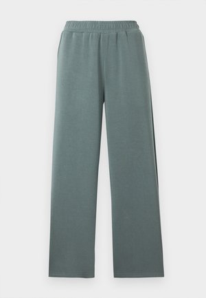 Pantalon à jambes larges en vert doux avec ceinture élastique, confectionné dans un tissu léger et doux, conçu pour une tenue décontractée.