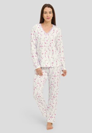 Conjunto de pijama floral en blanco, con flores rosas, manga larga y encaje en el escote. Tela suave y diseño de corte holgado.