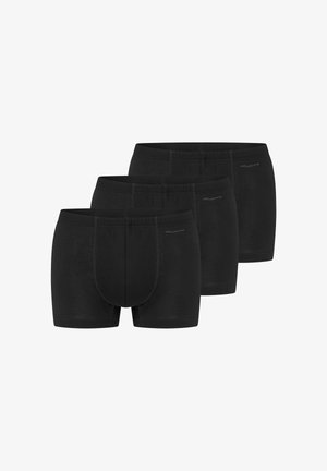 Drie zwarte herenslipboxers in een verspringende formatie, met voor- en zijkant stiksel details op een witte achtergrond.