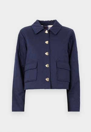 Navy quilted jacket with a collar, gold heart-shaped buttons, and two front pockets. Textured fabric with subtle heart patterns.