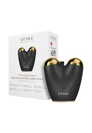 Appareil GESKE MicroCurrent Face-Lifter avec corps noir et sphères dorées, présenté à côté de son emballage affichant les caractéristiques du produit et les récompenses.