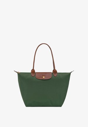 Green nylon tote bag with a brown leather top flap and handles. Features a gold button closure and a pocket on the front. Lightweight design.