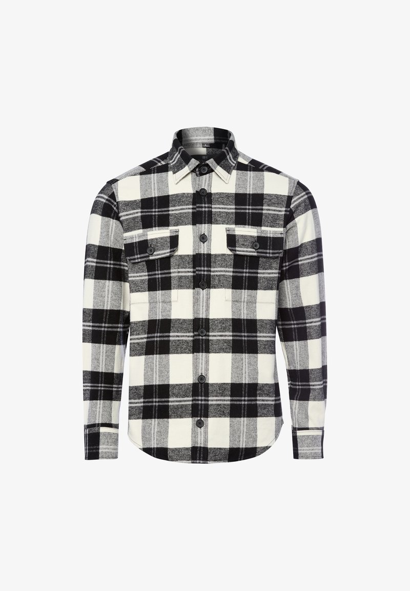 Chemise en flanelle à carreaux noir et blanc avec des manches longues, deux poches poitrine, des boutons noirs et un ourlet arrondi. Texture douce et motif classique.