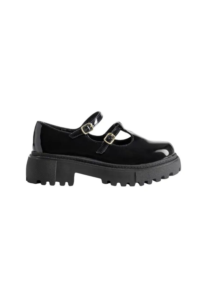 Chaussures Mary Jane en cuir verni noir avec deux sangles à boucle, semelle en caoutchouc noir épaisse et un design à bout rond avec des accents texturés.