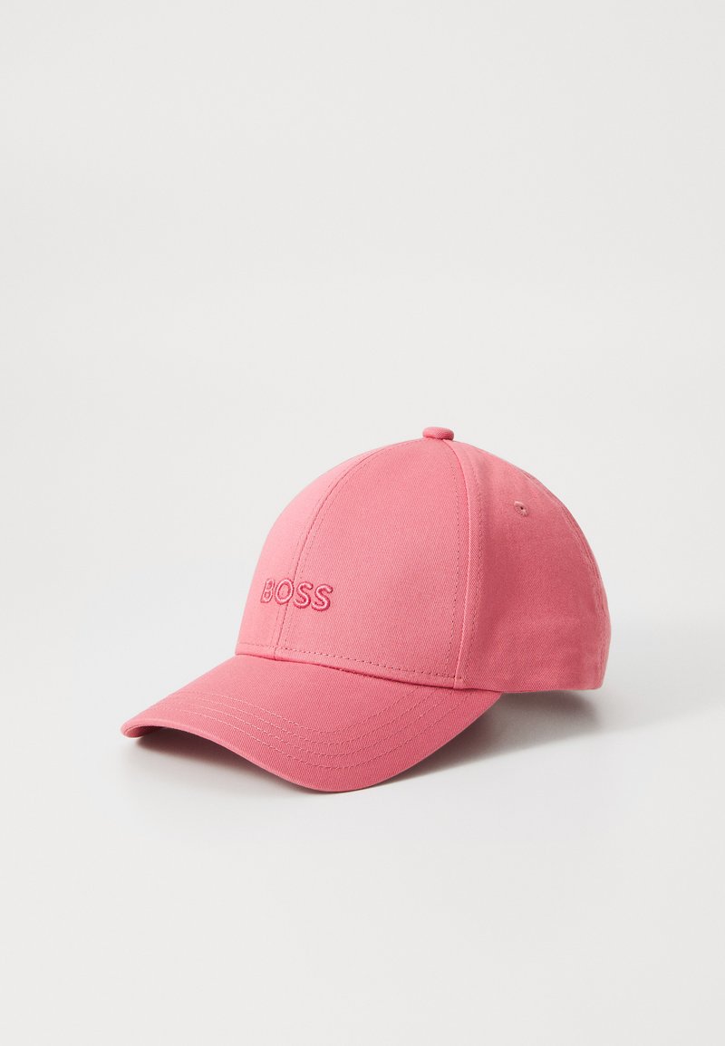 Casquette de baseball en coton rose avec un logo "BOSS" brodé à l'avant, visière incurvée et coutures renforcées.