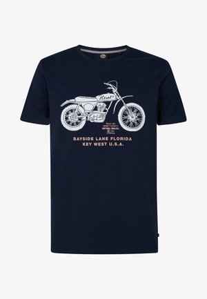 Marineblå bomulds T-shirt med et hvidt motorcykelgrafik. Teksten inkluderer "Petrol" og "Bayside Lane Florida, Key West U.S.A." i orange.