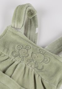 Soft green toddler overall with embroidered smiling mouse faces on the chest and adjustable shoulder straps.