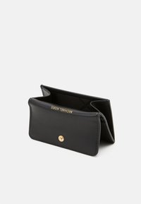 Black leather wallet with a gold snap closure, featuring an interior logo pattern and a structured, compact design.