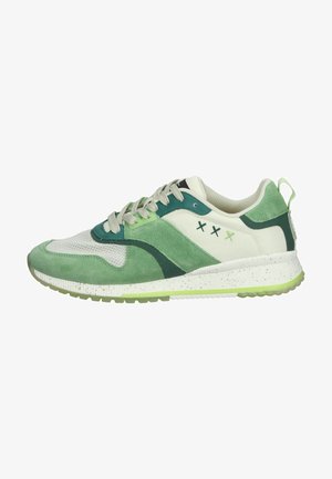 Green and white athletic shoe featuring suede and mesh materials, a layered design, laces, and a textured rubber sole with speckles.