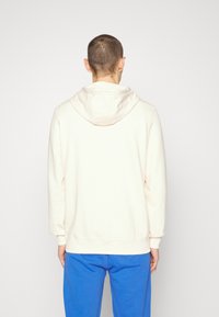 HUGO DARATSCHI - Sweatshirt com capuz - natural