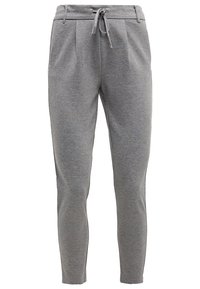 Graue Jogginghose aus weichem Stoff, mit einem Kordelzugbund, schmal zulaufenden Beinen und Seitentaschen. Minimalistisches Design ohne Muster.
