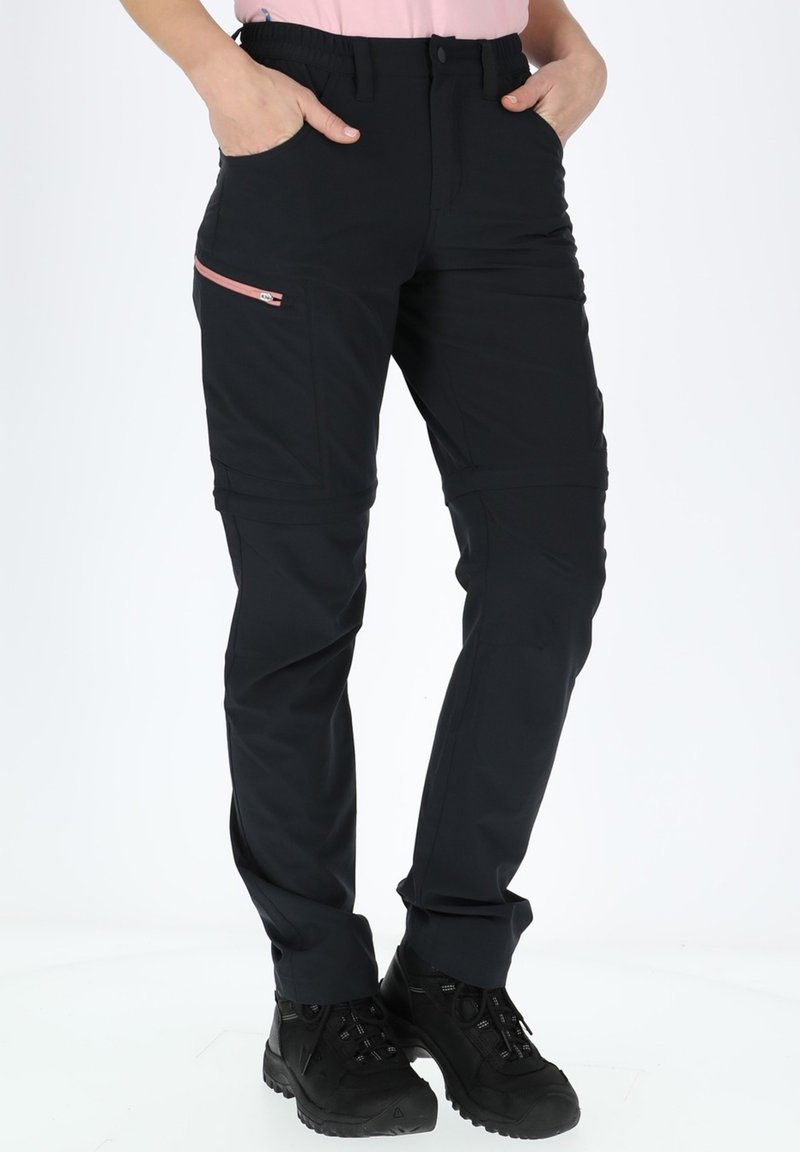 Black technical pants with a fitted design, featuring a zippered pocket in a contrasting pink color, and elastic waist. Textured fabric.