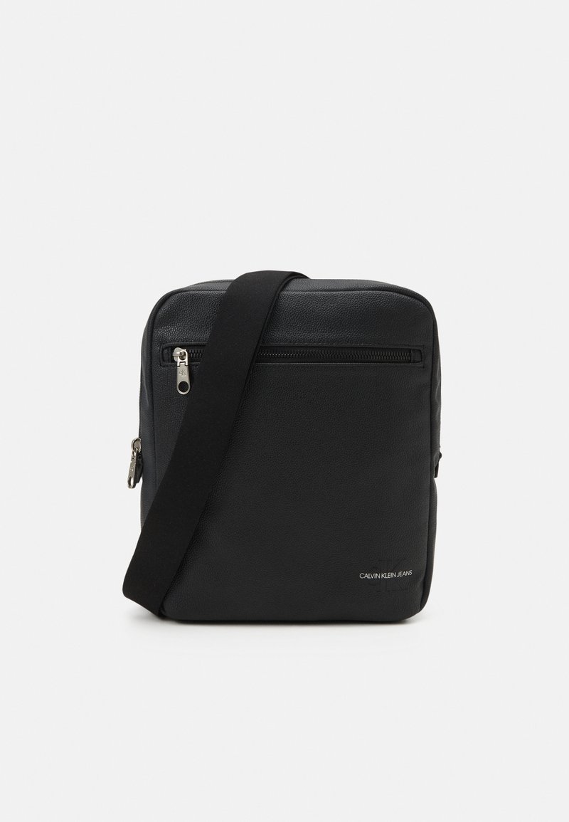 Calvin Klein Jeans MICRO PEBBLE REPORTER Sac bandoulière black/noir