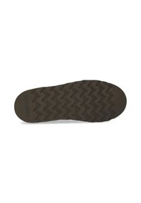 Suela de un zapato marrón con un patrón de tracción en zigzag y la marca "SHABBIES" en el área del talón.