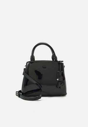 Black patent leather handbag with a structured shape, dual top handles, and a detachable shoulder strap. Features a branded metal charm.