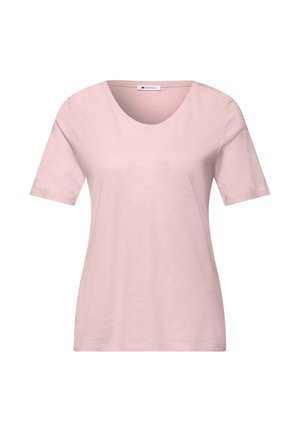 T-shirt pour femmes à manches courtes de couleur rose clair avec un large col rond, design uni et une petite étiquette à l'intérieur du col.