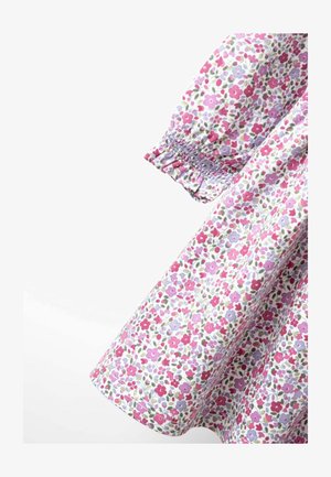 Ziedu apdrukas kleita ar rozā, purpursarkaniem un zaļiem rakstiem uz baltas auduma. Piedurkņu elastīgais šopings. Mīksta kokvilnas tekstūra.