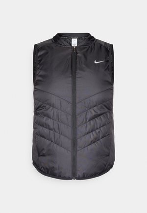 Schwarze ärmellose Weste aus glattem, leichtem Stoff. Mit vorderem Reißverschluss, hohem Kragen und Chevron-Steppmuster. Nike-Logo auf der Brust.