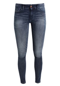 Jeans skinny de mezclilla azul oscuro con una cintura de media altura, diseño de cinco bolsillos y detalles de botones en tono cobre. Textura suave con ligeros desgastes.