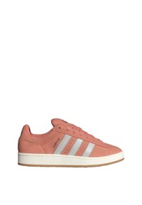 Pink suede sneaker with white leather three stripes, textured surface, round toe, and rubber sole. Features pink laces and branding on side.