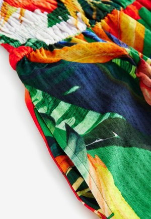 Kleurrijke gestreepte stof met levendige groene, oranje en blauwe tinten. Rimpeldetail en zachte textuur. Lichtgewicht en soepelvallend.