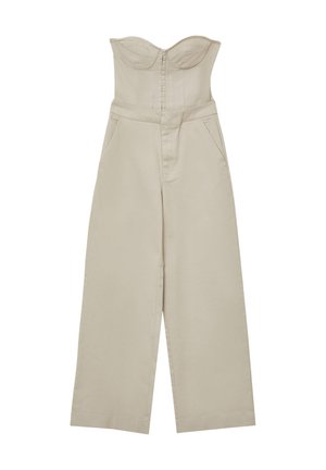Beige cotton jumpsuit with a structured, strapless bodice, front zipper closure, and wide-leg design; includes two side pockets.