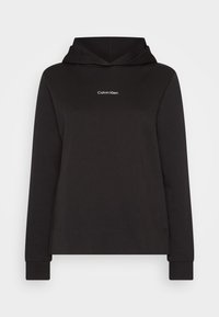 Felpa nera Calvin Klein con maniche lunghe e logo frontale, mostrata su uno sfondo semplice.