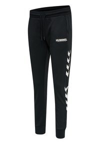 Svarta sweatpants med elastisk midja, dragsko och vitt "HUMMEL"-logotyp. Sidan har vita chevron-mönster. Slät textur.