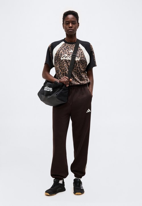 adidas ESSENTIALS 3 STRIPES LOOSE PANTS - Tracksuit bottoms - aurora coffee/ivory — photo 2
