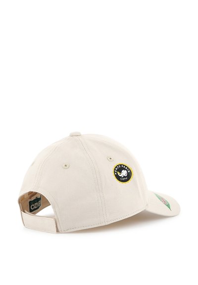 Casquette de baseball couleur crème en coton avec un logo circulaire noir et une sangle réglable à l'arrière. Visière incurvée et détails cousus.