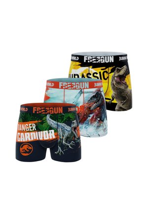 Trois paires de boxers pour hommes avec des motifs de dinosaures de Jurassic World et un texte en gras sur fonds noir, bleu et jaune.