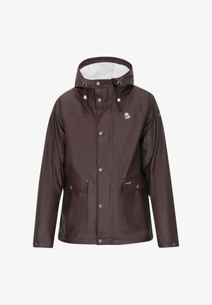 Ruskea vettä hylkivä takki hupulla, jossa on nepparilla kiinnitys, kaksi etutaskua ja logo vasemmassa rinnassa. Pehmeä sisävuori.