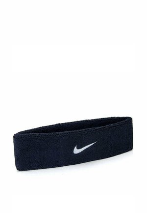 Fascia in cotone blu navy con una texture morbida, caratterizzata da un logo Nike swoosh bianco sulla parte anteriore. Design semplice, vestibilità elastica.