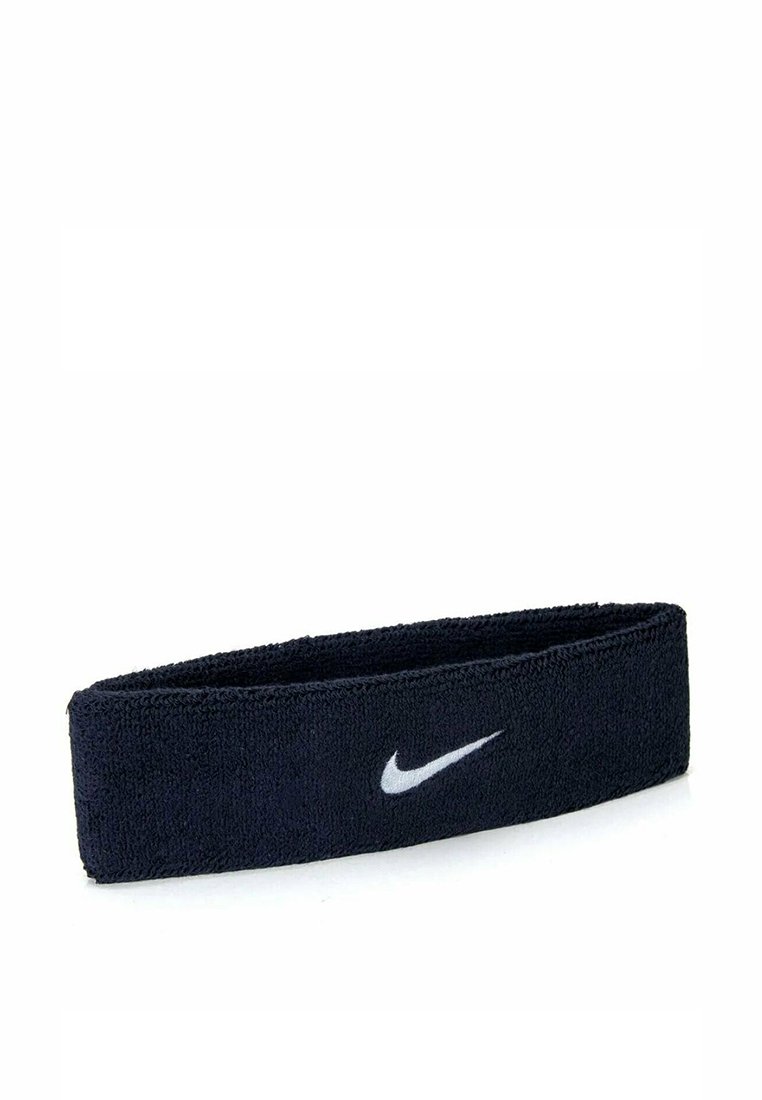 Fascia in cotone blu navy con una texture morbida, caratterizzata da un logo Nike swoosh bianco sulla parte anteriore. Design semplice, vestibilità elastica.