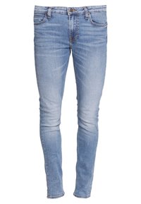 Ljust blå skinny jeans i denim, med en femficksdesign, subtil blekning och kontrastsömmar längs sömmarna.