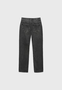 Musta suoralahkeinen farkut, joissa on vyötärönauhassa merkki, kaksi takataskua ja haalistunut pinta.