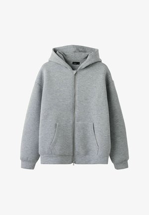 Siva zip-up kapuca s kapuco, izdelana iz mehkega, teksturiranega blaga. Ima velike sprednje žepke in rebraste manšete za sproščen fit.