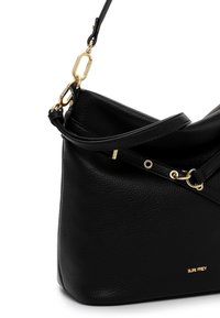 Black textured leather handbag with adjustable strap and gold-tone hardware, featuring small gold brand logo "SURI FREY" on front.